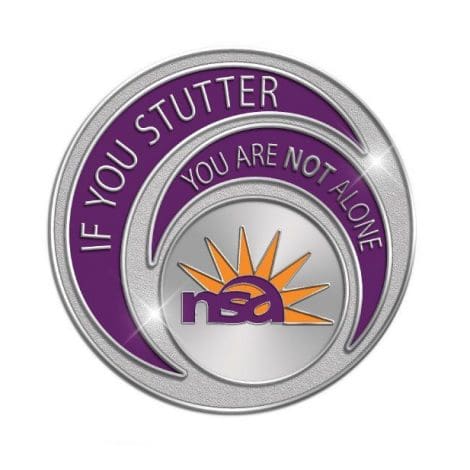 A circular silver 'If You Stutter, You Are Not Alone' lapel pin badge with a purple and orange design, featuring the text "if you stutter, you are not alone" and the logo of the national stuttering association (nsa) with a rising sun motif.