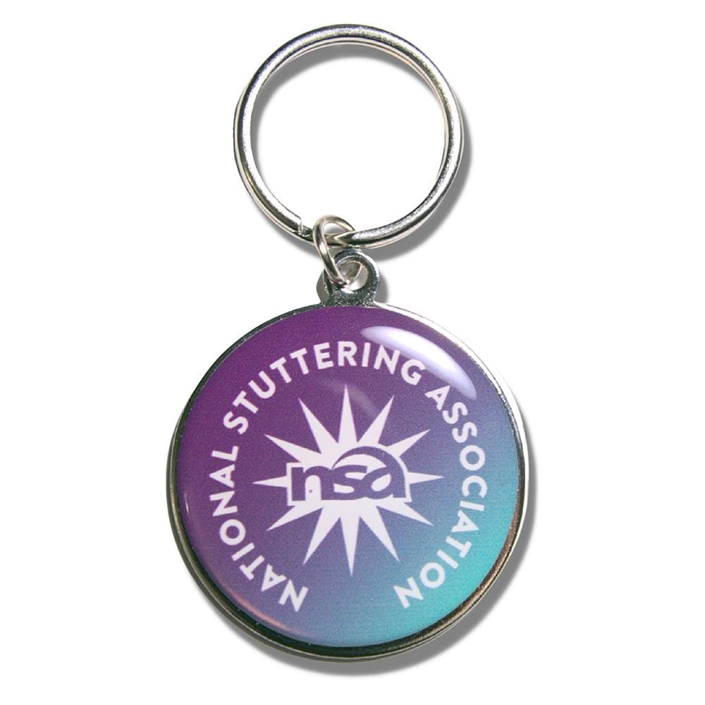 A NSA Logo Keychain featuring the logo of the national stuttering association, with a purple and blue radial design and the initials "nsa" prominently displayed.