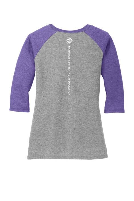 A WeStutter Women's 3/4 sleeve baseball t-shirt featuring a grey body and contrasting purple sleeves, with the text "annual run/walk marathon" and a snowflake logo vertically on the back.