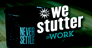 A black mug with the words "Never Settle" sits on a table. Overlaid white text reads "nsa we stutter @work," with the "s" stylized as a starburst logo. The background is dark, highlighting the mug and text, making it perfect for employers seeking to inspire determination in their team.